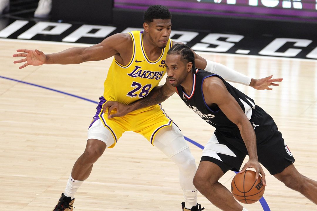 Kawhi Leonard (d) no estará con el equipo olímpico de Estados Unidos. EFE/EPA/ALLISON DINNER SHUTTERSTOCK OUT