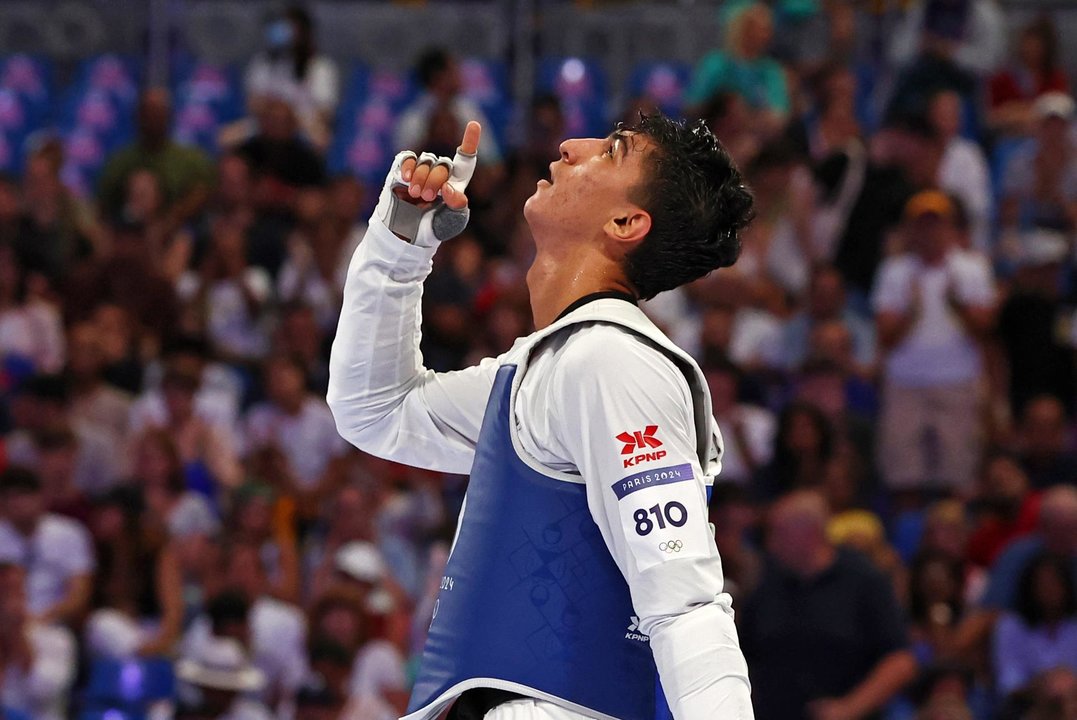 El iraní Arian Salimitras su combate de taekwondo en la categoría de +80 kilos EFE/EPA/DIVYAKANT SOLANKI